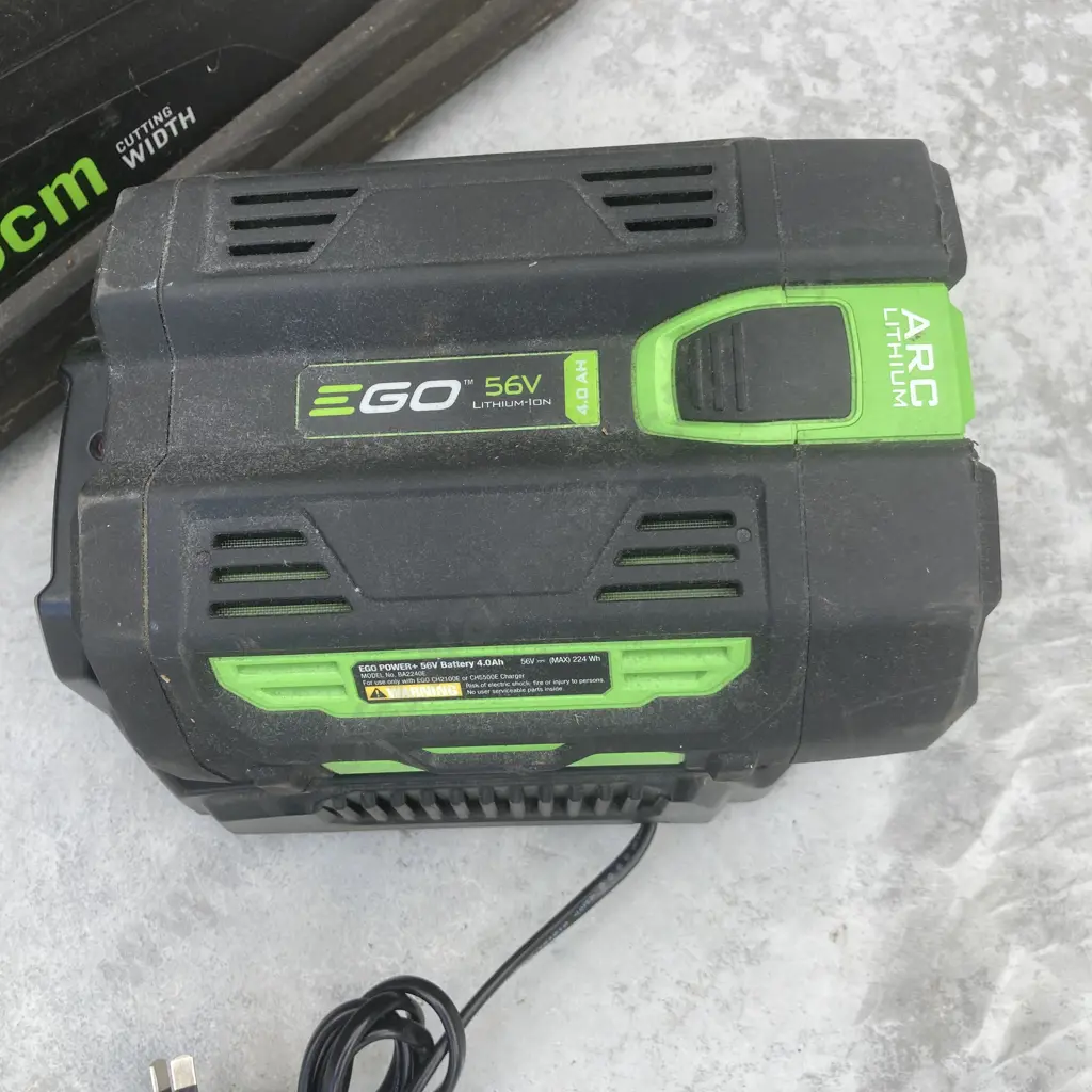 EGO+ 56V Power Mower With Catcher, 49cm, Side Discharge & Mulching Plugs, & Line Trimmer, 33cm, 4.0Ah Battery & Charger Image 1++