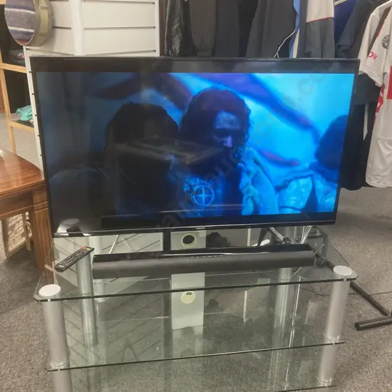 Veon 48" Full HD LED/LCD TV With Remote (Screen Darker One Side), Veon 2.0ch TV Soundbar (No Remote)