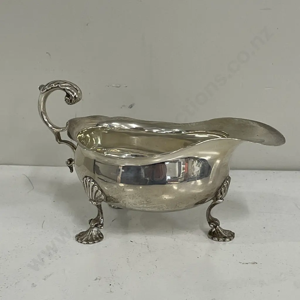Sterling Silver Harrods 3 footed jug. Hallmarked as shown Image 1++