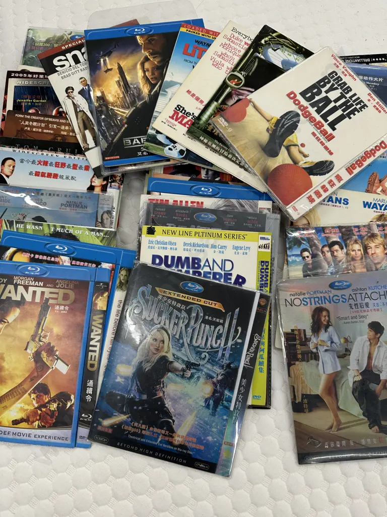 Selection of DVDs In Soft Covers Image 1++