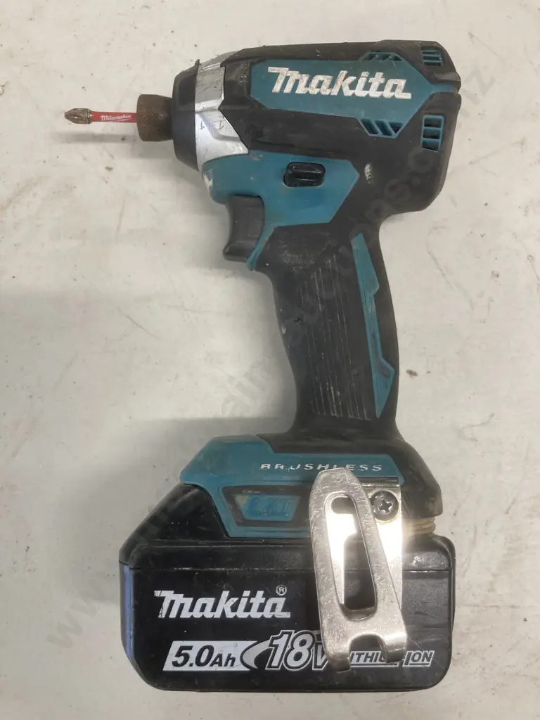 Makita 18V Impact Driver Brushless LXT Skin, Model DTD153 With A 5.0Ah Battery Image 1++