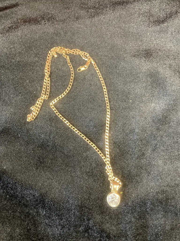 Oval Pendant With Clear Sparkling Stone On Gold Chain (Chain Stamped 375, Pendant Stamped 9ct) Image 1++