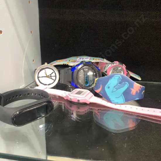Selection of Six Watches And a Fitness Tracker