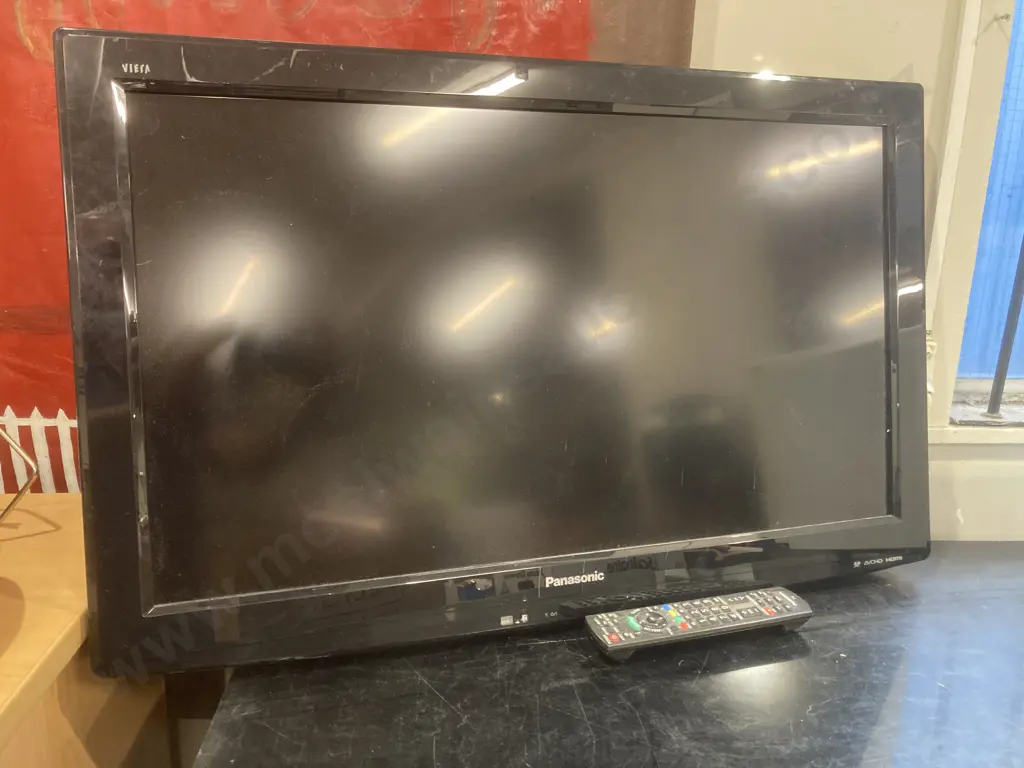 Panasonic 32" TV With Remote, Model TH-L32X20Z (no base has 1/2 wall mount attached) Image 1++