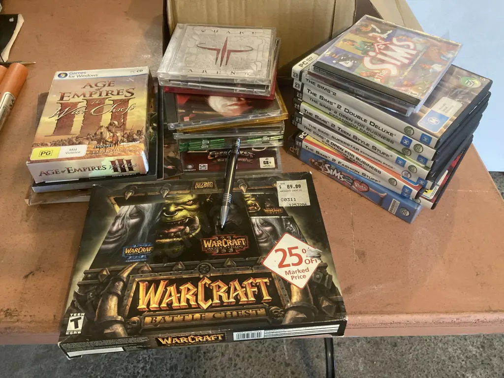 Assorted PC Games, Warcraft, Age Of Empires, Quake Arena Etc & 10 x  Sims Games Image 1++