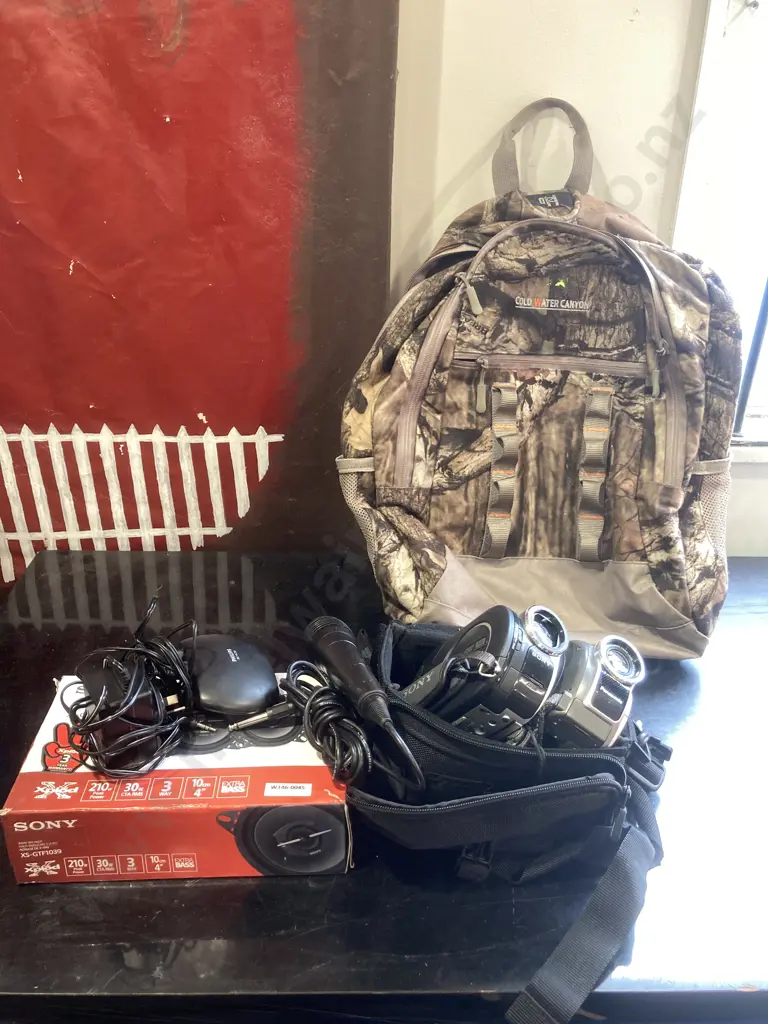 Cold Water Canyon Backpack, Sony 3-Way Car Speakers In Box, Panasonic DVD Video Camera, Sony Handycam Etc Image 1++
