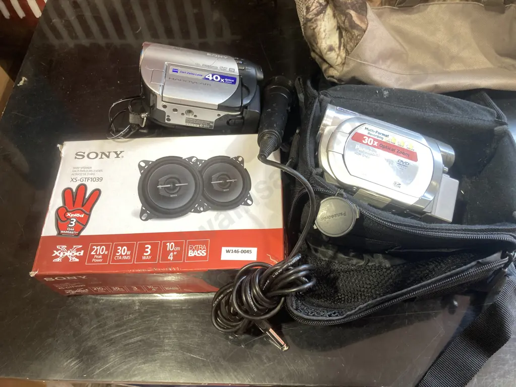 Cold Water Canyon Backpack, Sony 3-Way Car Speakers In Box, Panasonic DVD Video Camera, Sony Handycam Etc Image 1++