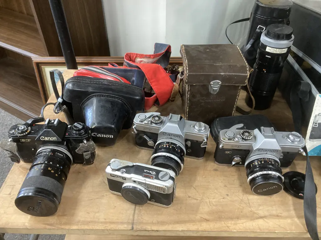 Vintage Canon Cameras x 4 - FT, FT QL, EF & Bell & Howell, Canon FD 100-200 Lens, Assorted Lenses, Case Etc Image 1++