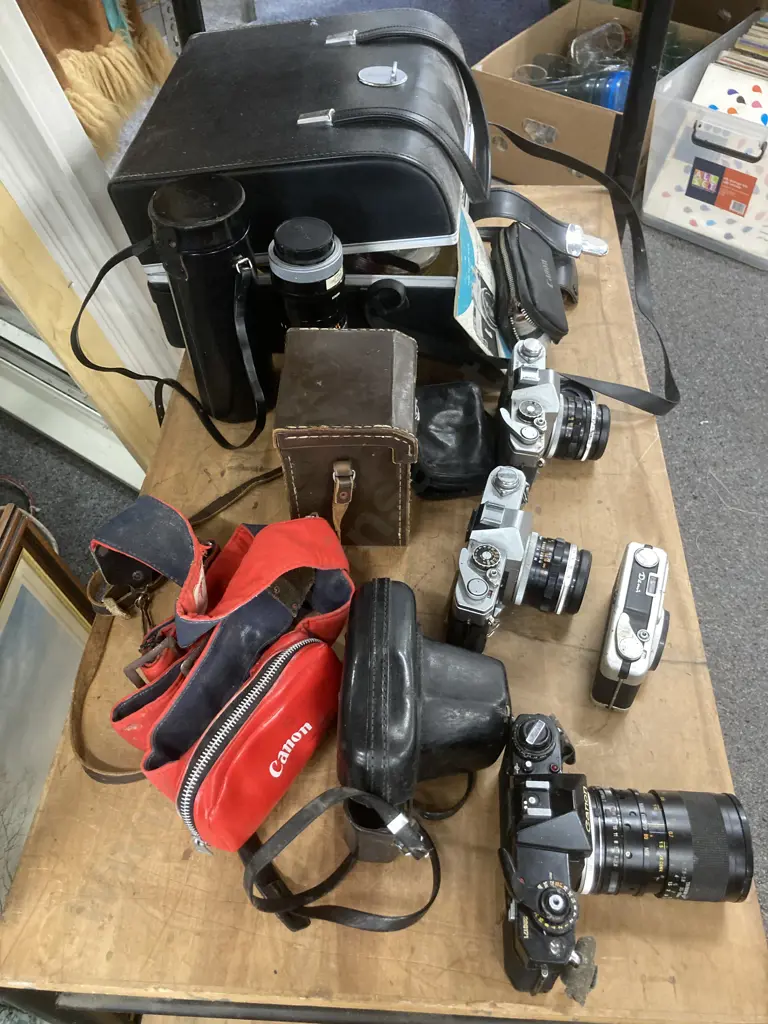 Vintage Canon Cameras x 4 - FT, FT QL, EF & Bell & Howell, Canon FD 100-200 Lens, Assorted Lenses, Case Etc Image 1++