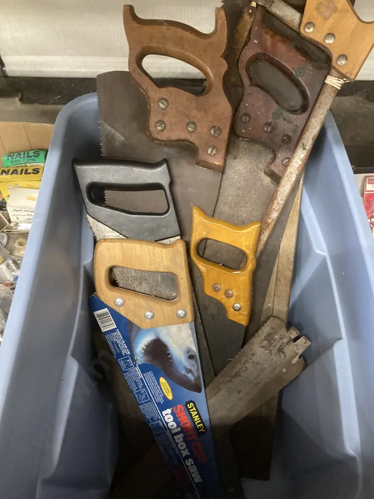 Grey Bin of Nine Assorted Saws, Blades & Mitre Saw Stand Image 1++