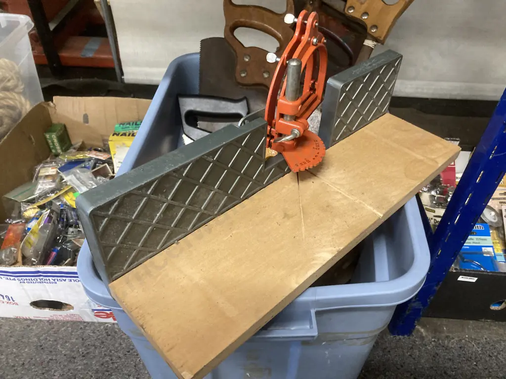 Grey Bin of Nine Assorted Saws, Blades & Mitre Saw Stand Image 1++