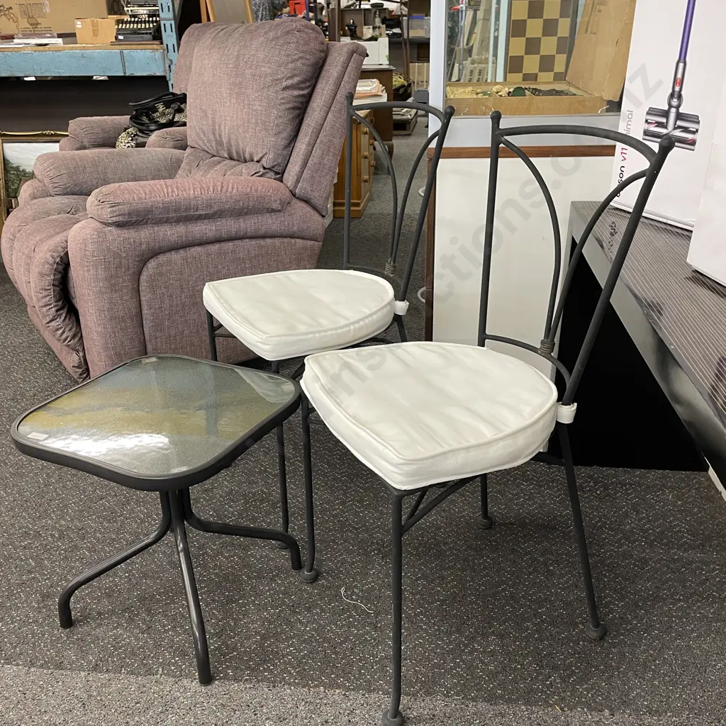 Ornate Metal 3 Piece Outdoor Set. 2 chairs with cream fabric squabs and glass top table Image 1++
