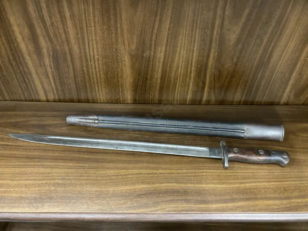 Vintage Wilkinson Pattern 1907 Bayonet With Leather Scabbard, Regimental Marks '12RF' and '253'  Stamped To Pommel Image 1++