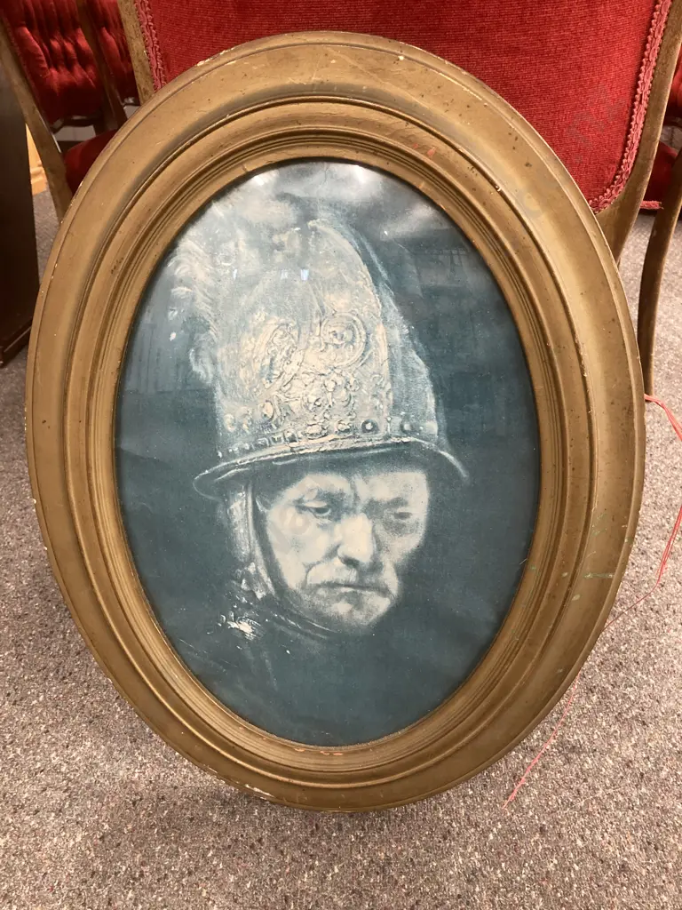 Oval Wooden Framed Print Of Man With Golden Helmet H63cm, W48cm. Image 1++