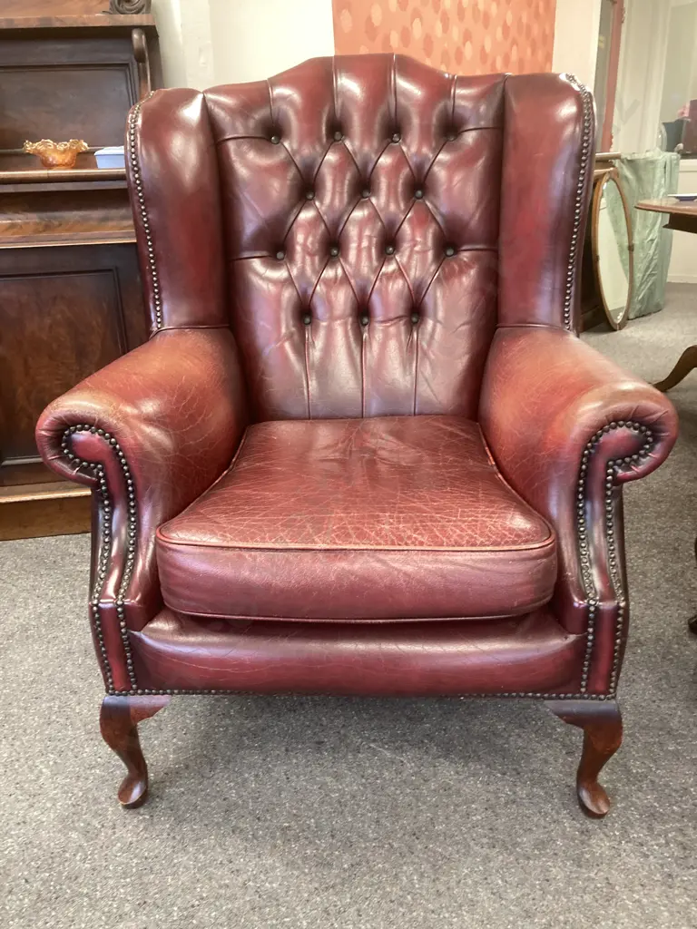 Leather Chesterfield Wingback Armchair With Traditional Queen Anne Footstool, Burgundy Button Backed, Domed, W85cm Image 1++