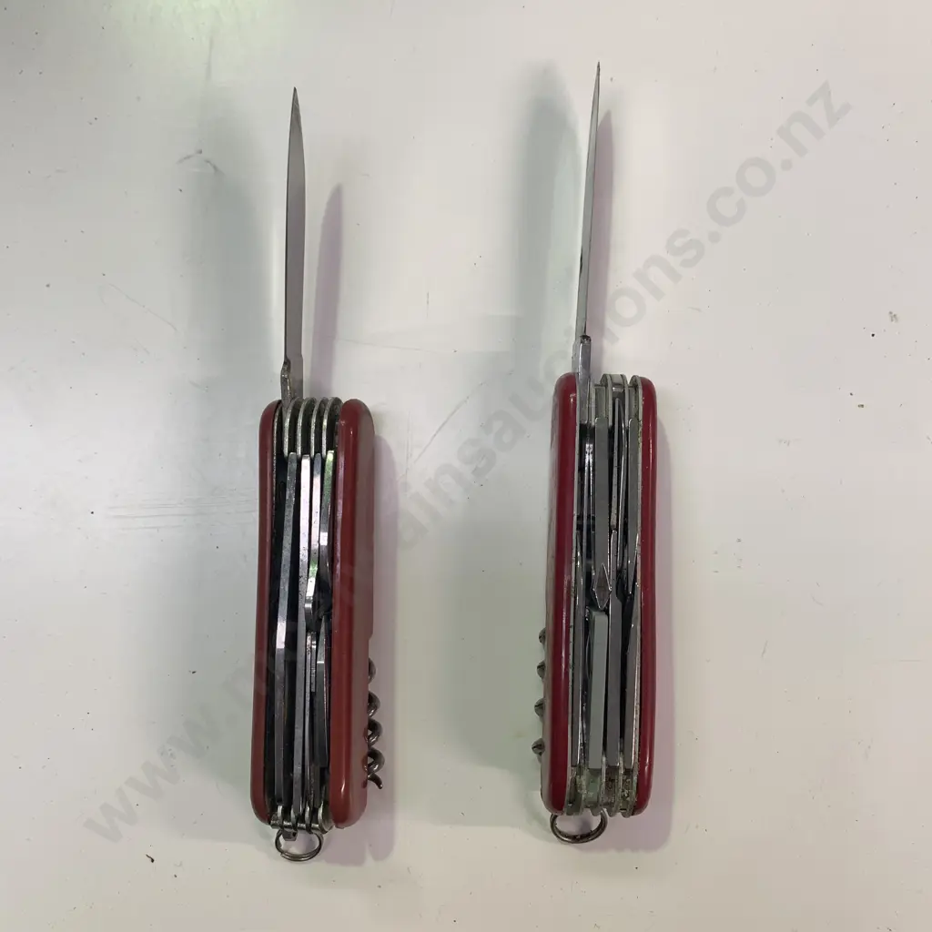 Victorinox Swiss Army Knife with one other Stainless Steel Pocket Knife Image 1++