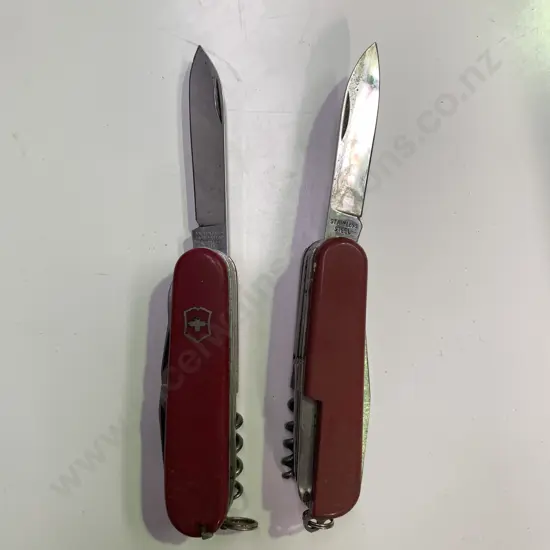 Victorinox Swiss Army Knife with one other Stainless Steel Pocket Knife