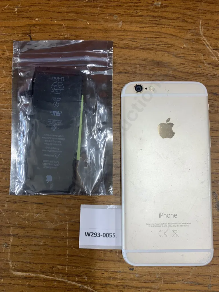 Apple iPhone Model A1586 & An iPhone 6s Replacement Battery Image 1++