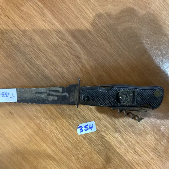 Vintage SOLINGEN Germany Multi Knife containing multiple Blades and corkscrews etc in handle