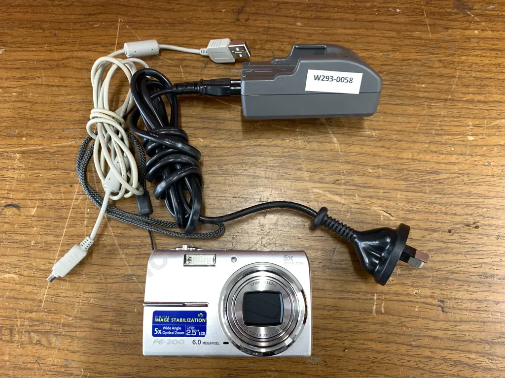 Olympus FE-200 6MP Digital Camera with Digital Image Stabilized 5x Optical Zoom, Charger & Lead Image 1++