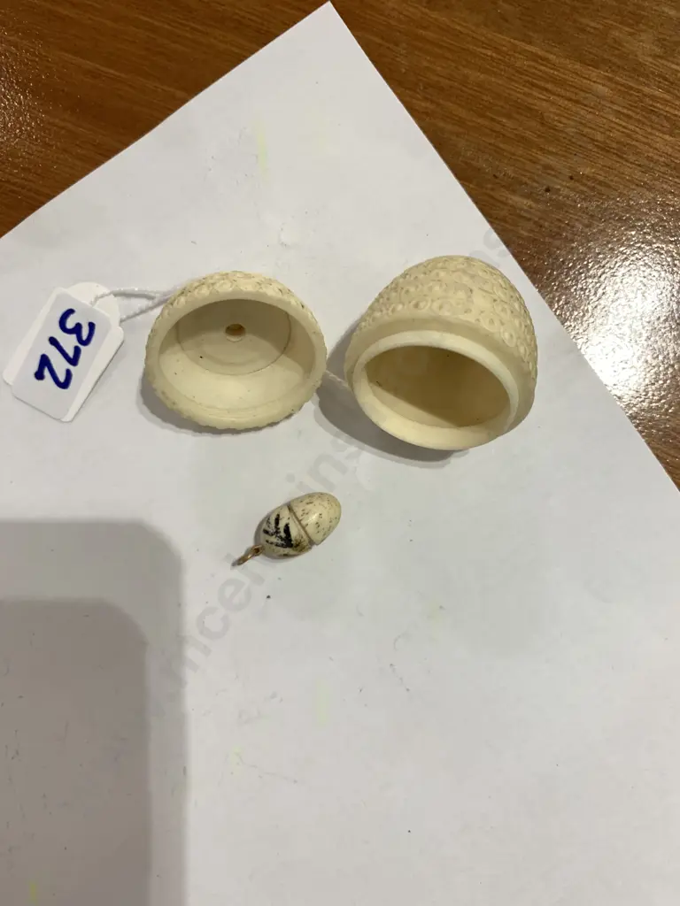 Miniature Ivory? Egg shaped screw container with mini handpainted and gilded internal egg Image 1++