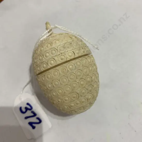 Miniature Ivory? Egg shaped screw container with mini handpainted and gilded internal egg