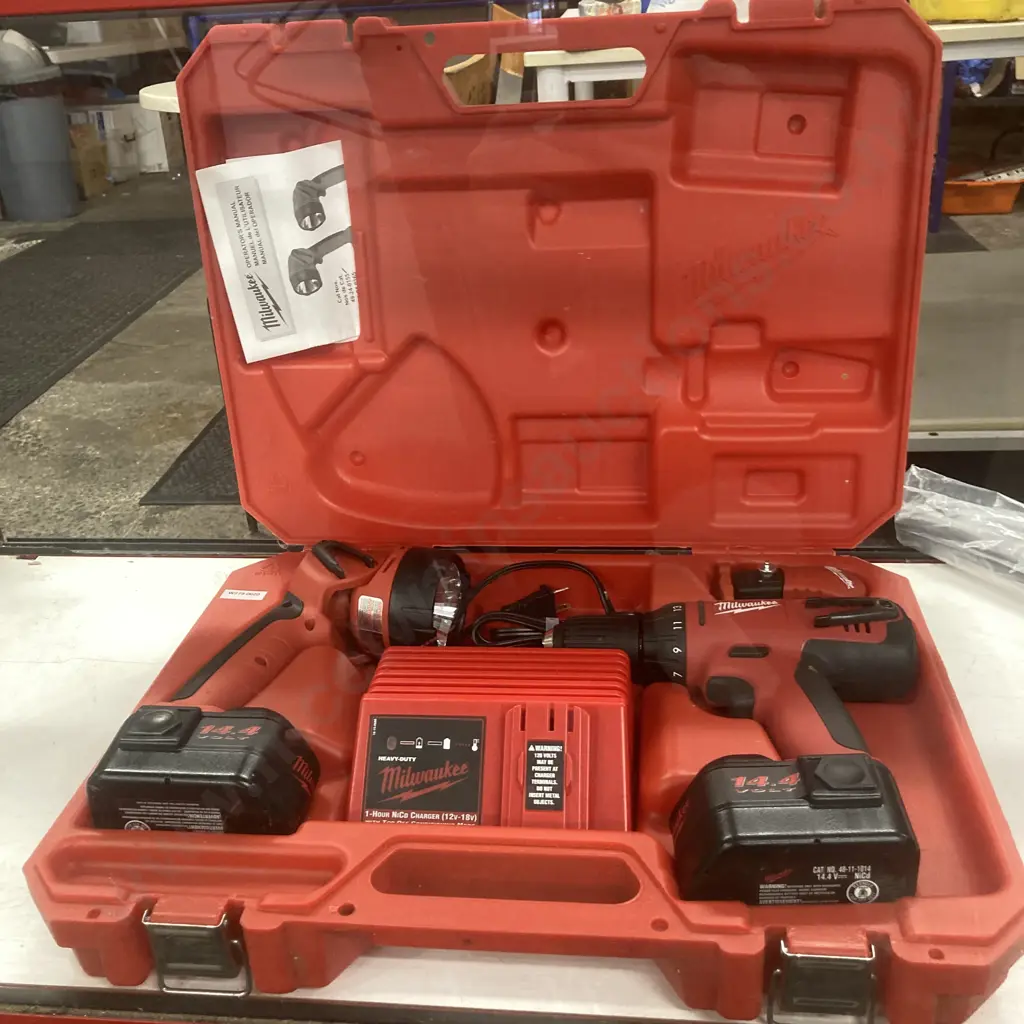 Milwaukee 14.4V 13mm Drill/Driver & Flashlight Kit With Charger, 2 Batteries, Manuals & Case (Needs NZ Plug Adapter) Image 1++
