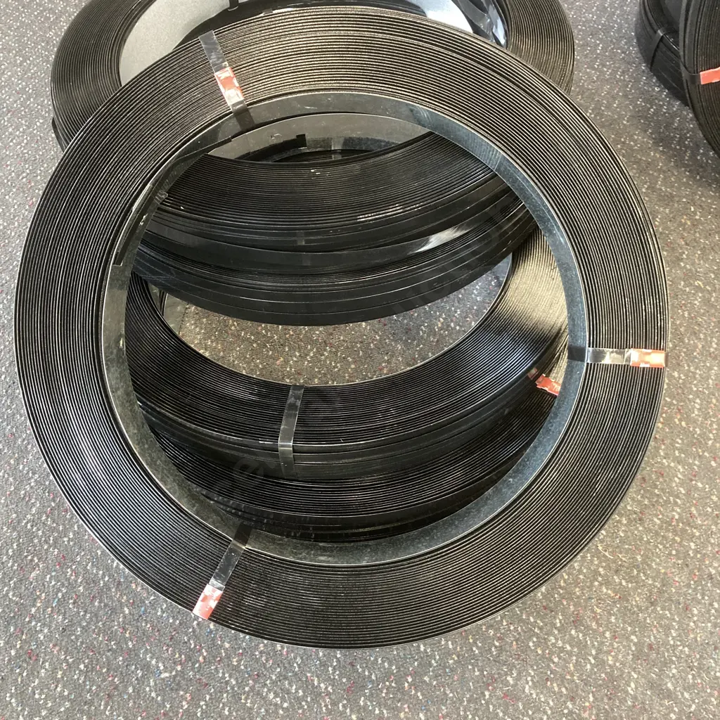 Fifteen Rolls of 16mm Black High Tensile? Steel Strapping, 45-50Kg? Each Roll, 545mm Dia, 60mm Core Image 1++