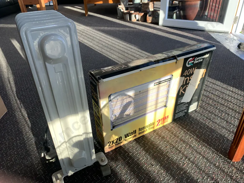 Commercial Electric 40 Watt Insect Killer And 5 Fin Oil Heater Image 1++