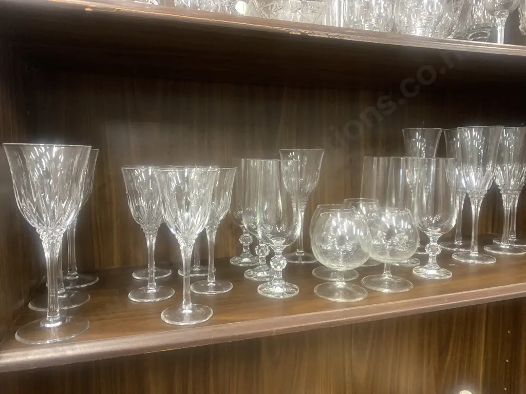 Assortment Of Crystal Glasses Including Champagne, Wine, And Brandy. Image 1++