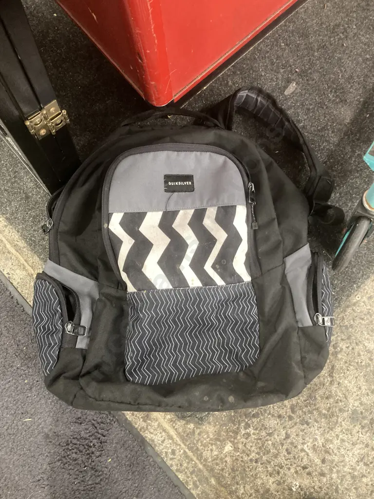Black Quiksilver Backpack With A Green Milazo RGS Kids Scooter Image 1++