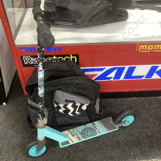 Black Quiksilver Backpack With A Green Milazo RGS Kids Scooter
