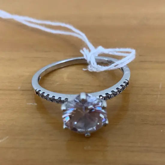 Sterling Silver Ladies Ring With Large Single Gem & Smaller Gems on The Band