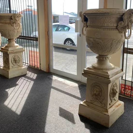 Pair of Cream Cast Iron Ornate Double Handled Garden Urns On Plinths, 83 x 81cm on 63 x 48 x 48cm Plinth, 224Kg