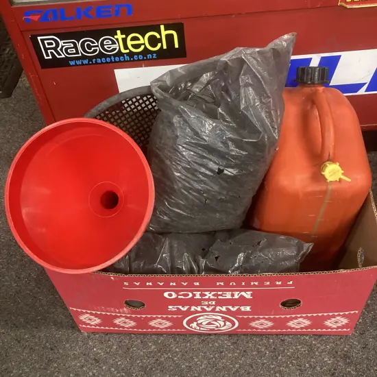 Box of BBQ Charcoal, Gas Can, Strainer Etc