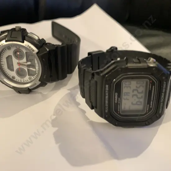 Watches x 2, Black Strap, 1 x Casio , 1 x Digital