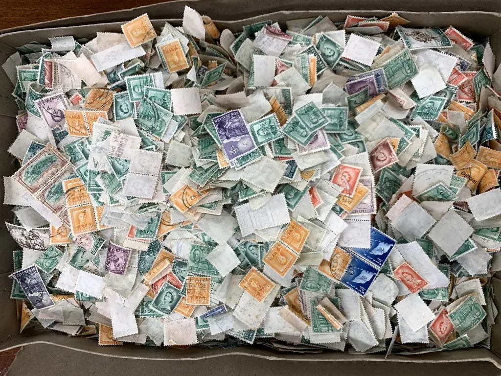 Box of Assorted New Zealand Stamps Image 1++