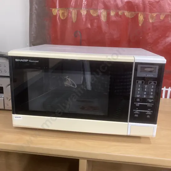 Sharp Carousel Microwave, Model R-340R(W) With Manual