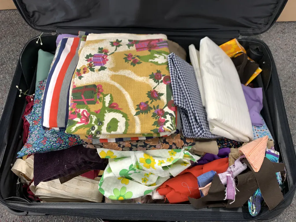 Bon Voyage Suitcase With Assorted Fabric Pieces Image 1++