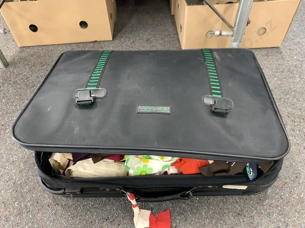 Bon Voyage Suitcase With Assorted Fabric Pieces Image 1++