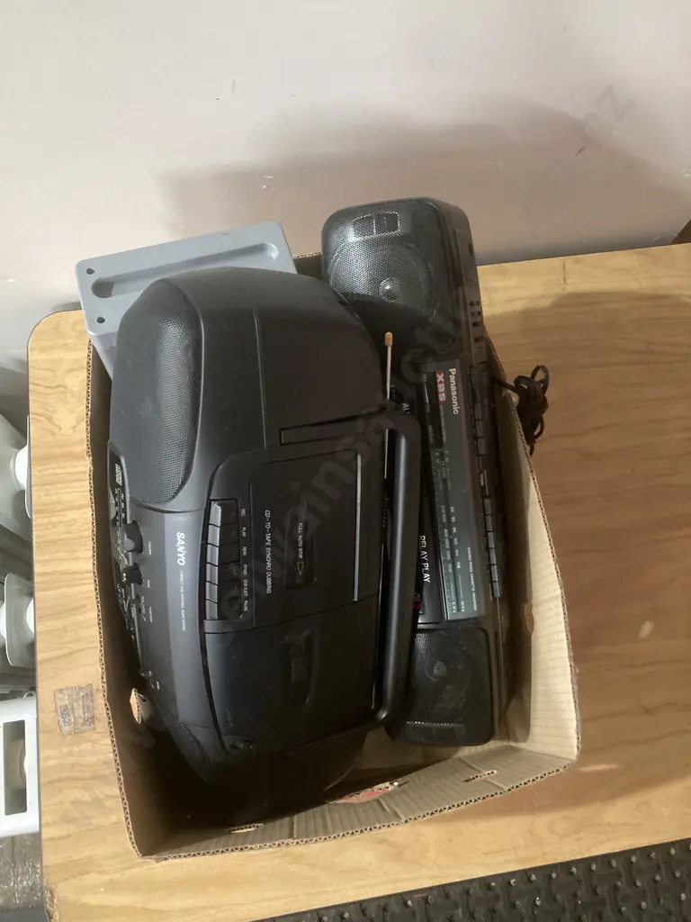 Box of Goldair Fan Heater, Sanyo & Panasonic Portable Stereos Image 1++