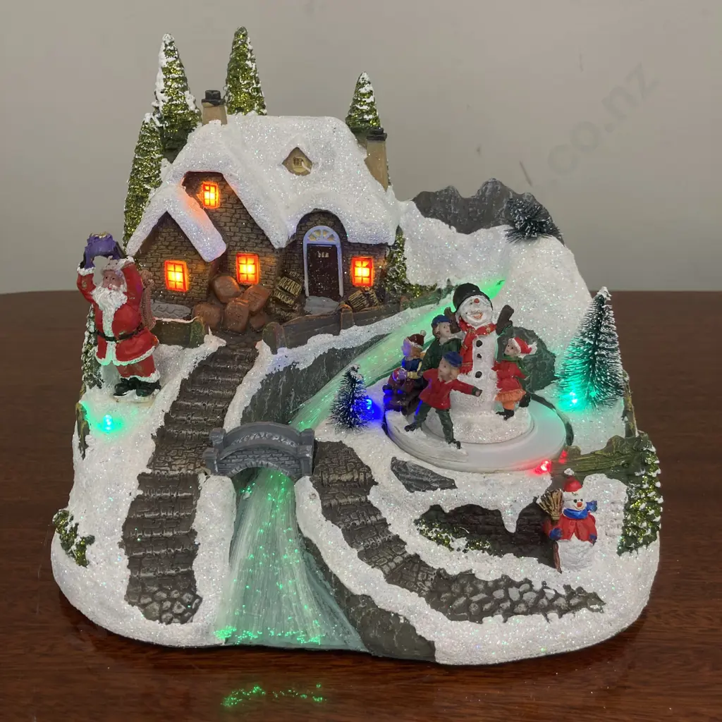 Christmas Wishes Christmas Village With LED, Animation, Music On/Off (Factory Second - Boy Missing Arm) H20 W23 D19cm Image 1++