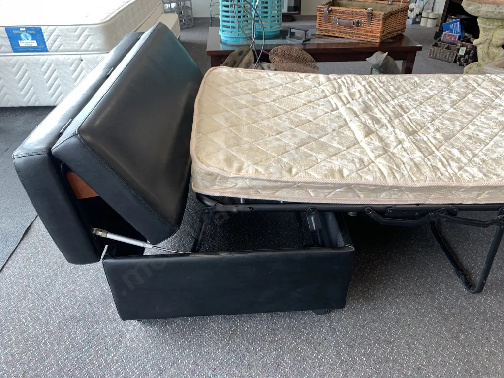 Modern Black Leather Look Ottoman Sofabed, As New, H40 W120 D70cm Image 1++