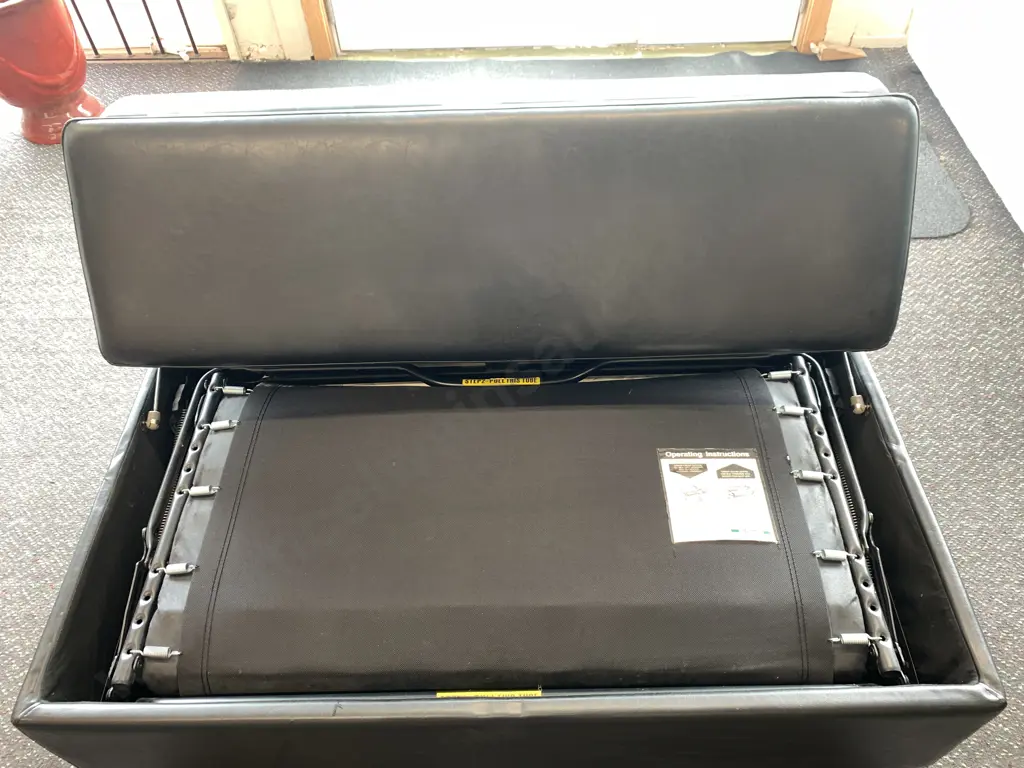Modern Black Leather Look Ottoman Sofabed, As New, H40 W120 D70cm Image 1++