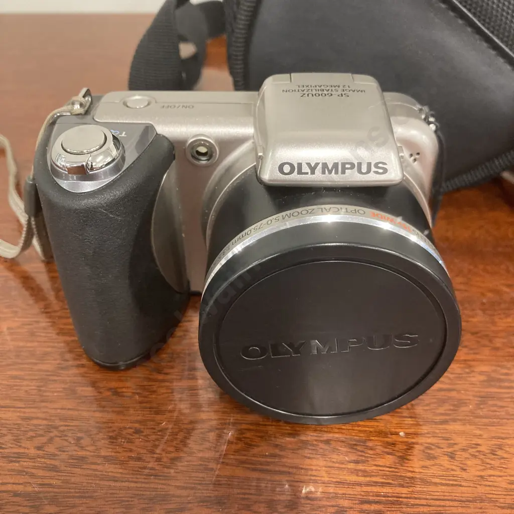 Olympus SP-600UZ Digital Camera With Case, 12 Megapixel, 15x Wide Optical Zoom 5.0-75.0mm 1:3.5 - 5.4 Image 1++