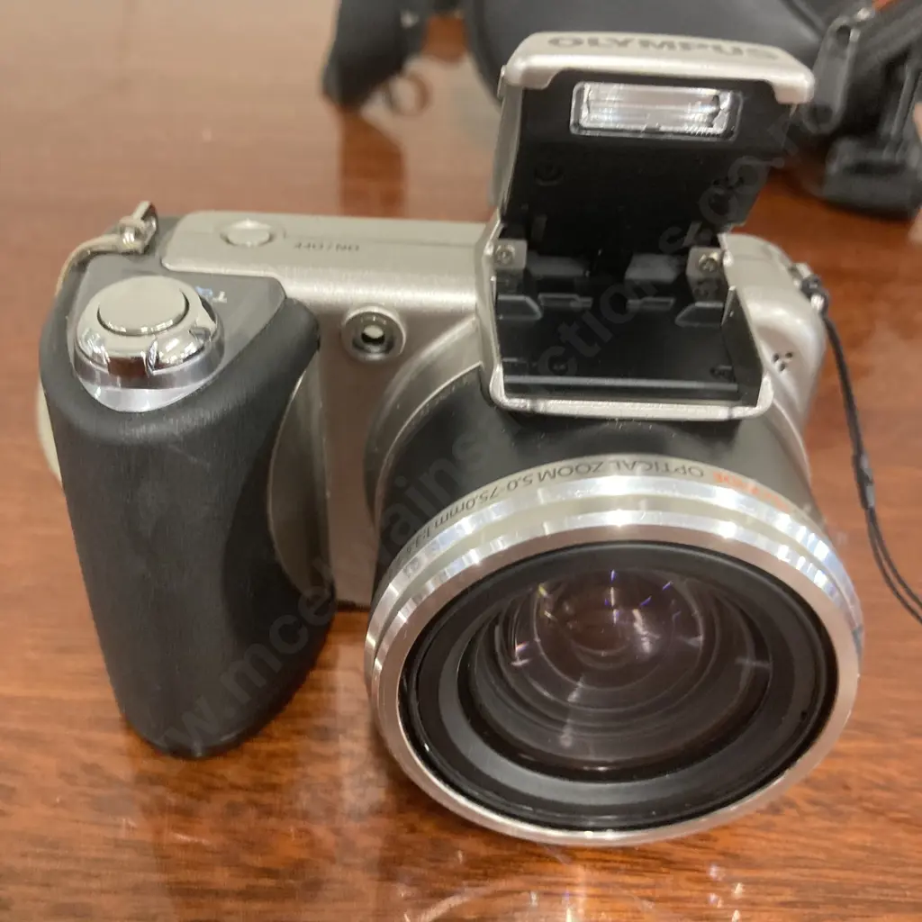 Olympus SP-600UZ Digital Camera With Case, 12 Megapixel, 15x Wide Optical Zoom 5.0-75.0mm 1:3.5 - 5.4 Image 1++