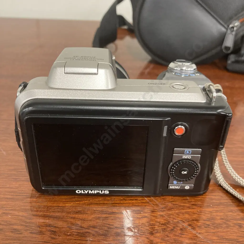 Olympus SP-600UZ Digital Camera With Case, 12 Megapixel, 15x Wide Optical Zoom 5.0-75.0mm 1:3.5 - 5.4 Image 1++
