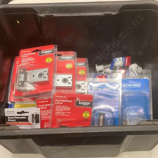 Black Bin of Assorted Packs of Legge & Schlage Hardware, Holdfast Door Stops Etc