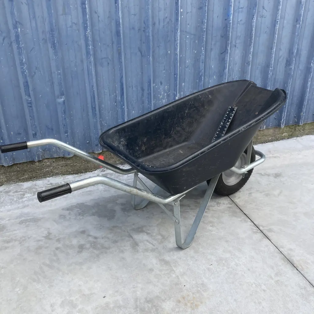 Wheelbarrow With a Black Poly Tray With Pour Lip & a Builders Square Image 1++