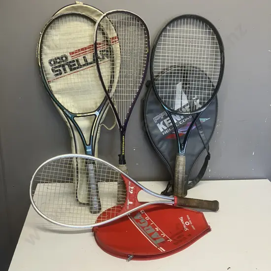 Three Tennis Racquets And a Squash Racquet